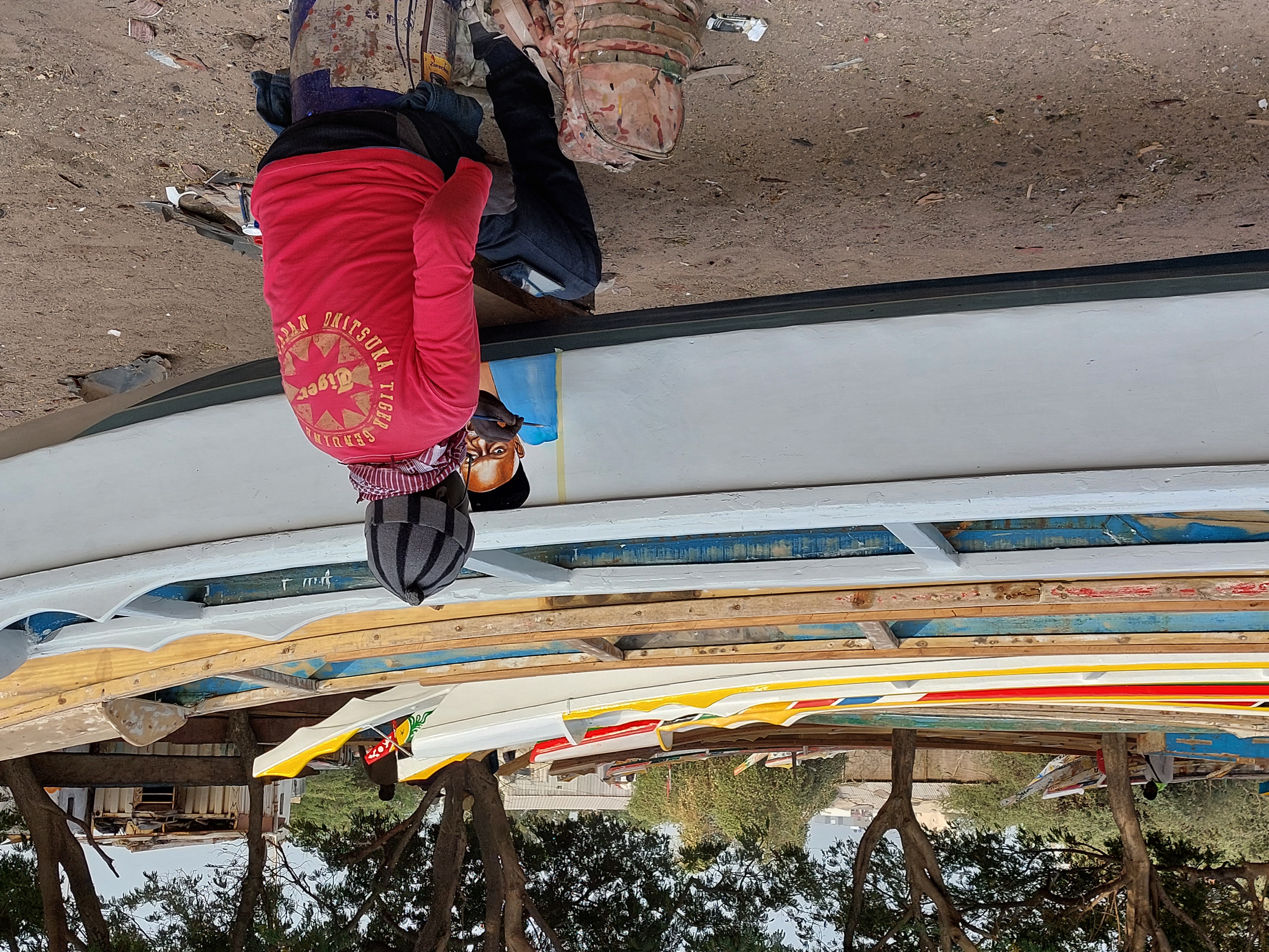 Preparing the boat for departure - drawing a talisman Image